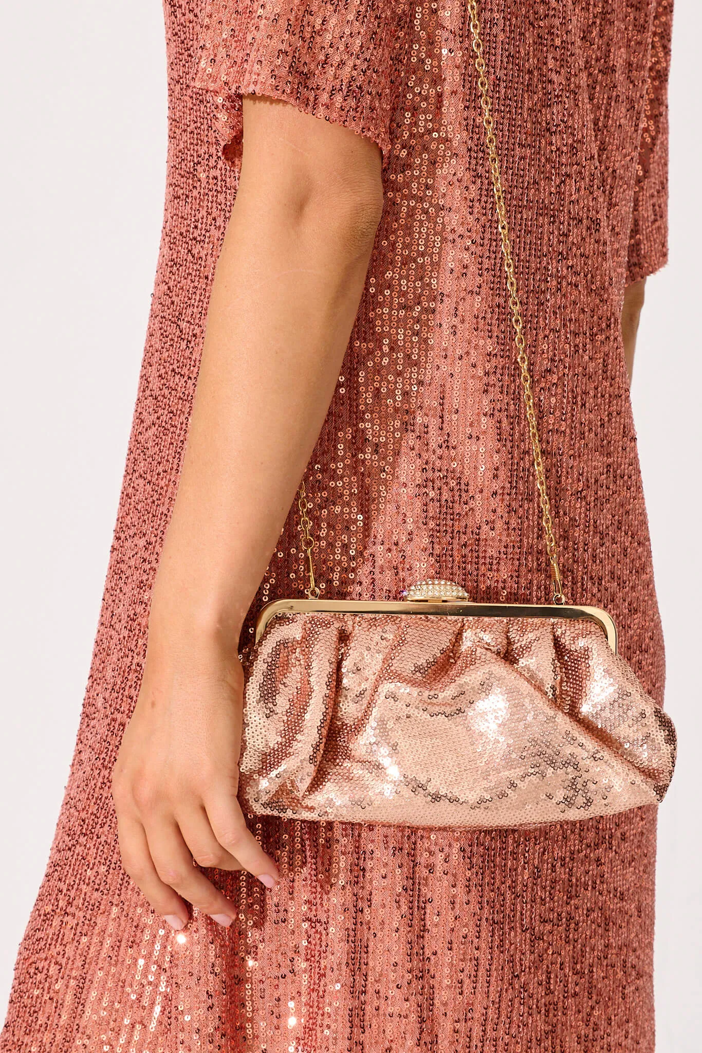 Aida Clutch Bag In Rose Gold Sequin