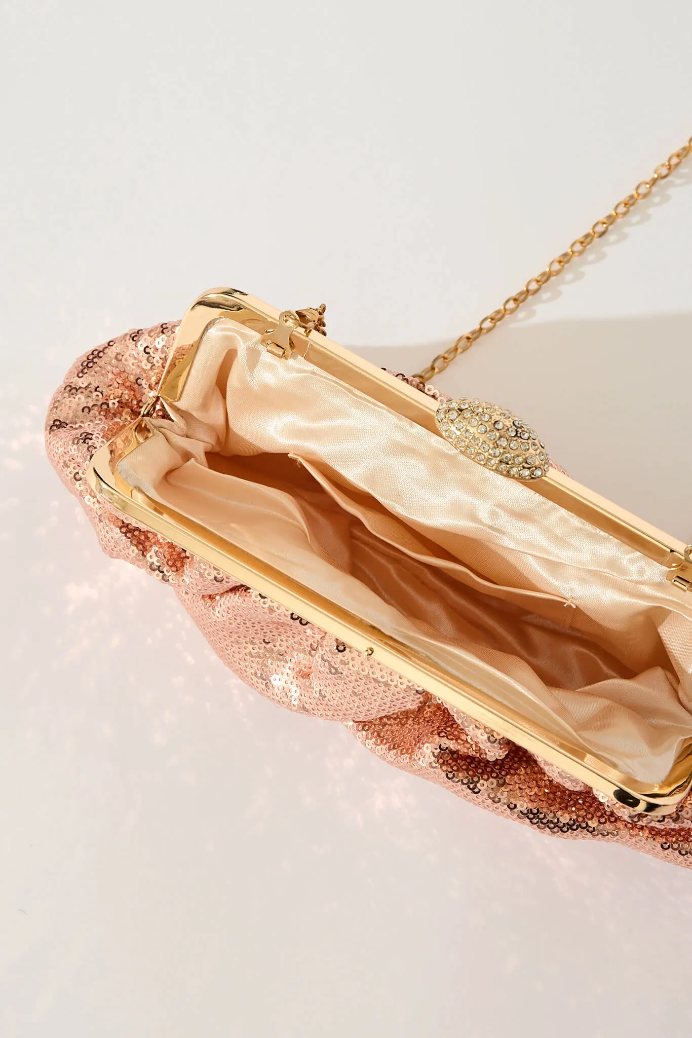 Aida Clutch Bag In Rose Gold Sequin