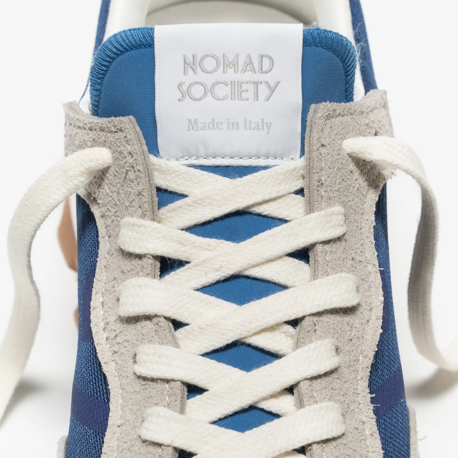 Blue and sand eco-leather sneakers.