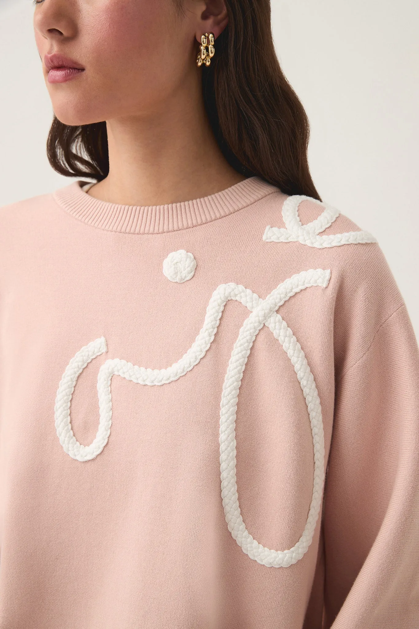 Knit Jumper with Symbolic Calligraphy Design