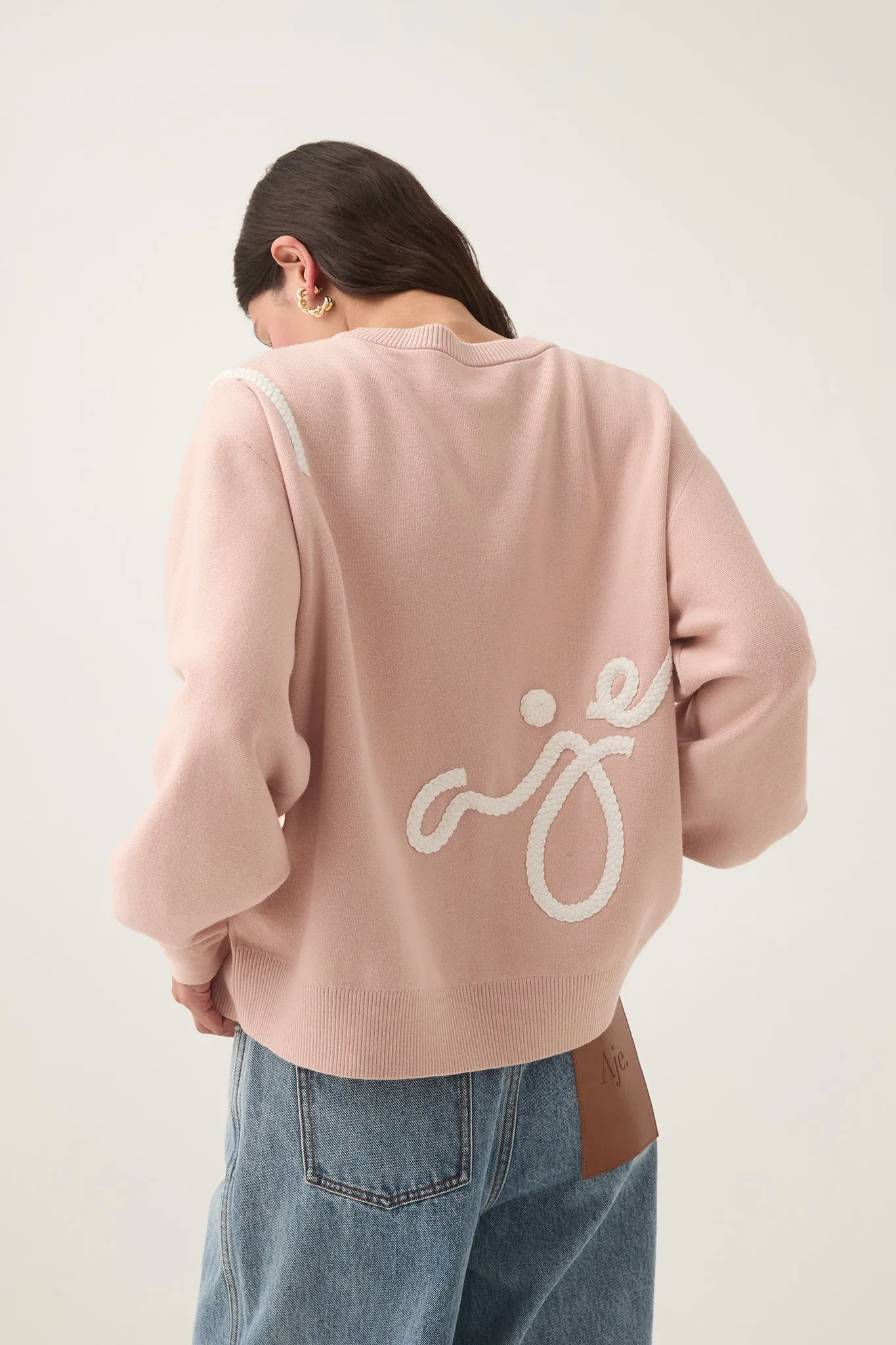 Knit Jumper with Symbolic Calligraphy Design