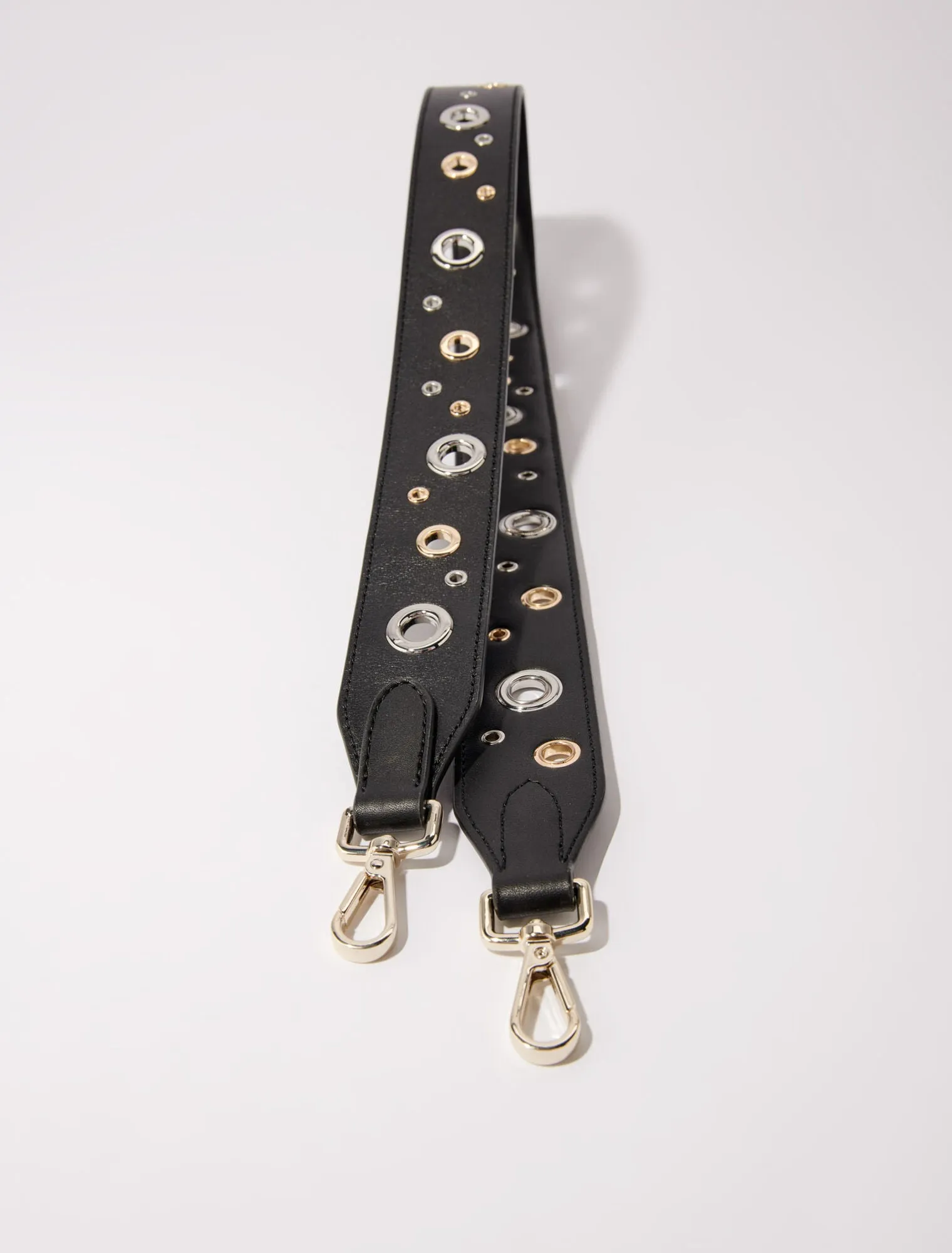 Leather shoulder strap with eyelets