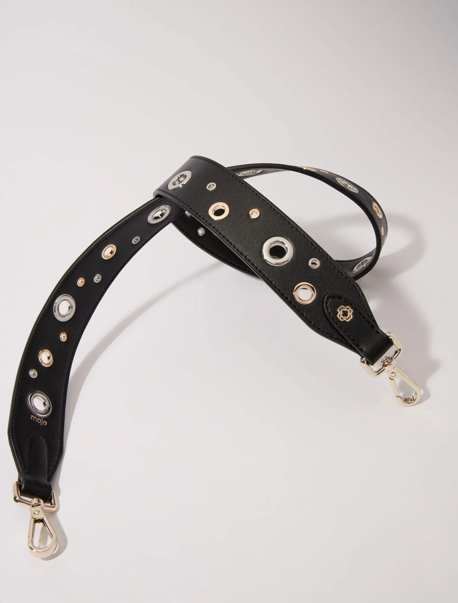 Leather shoulder strap with eyelets