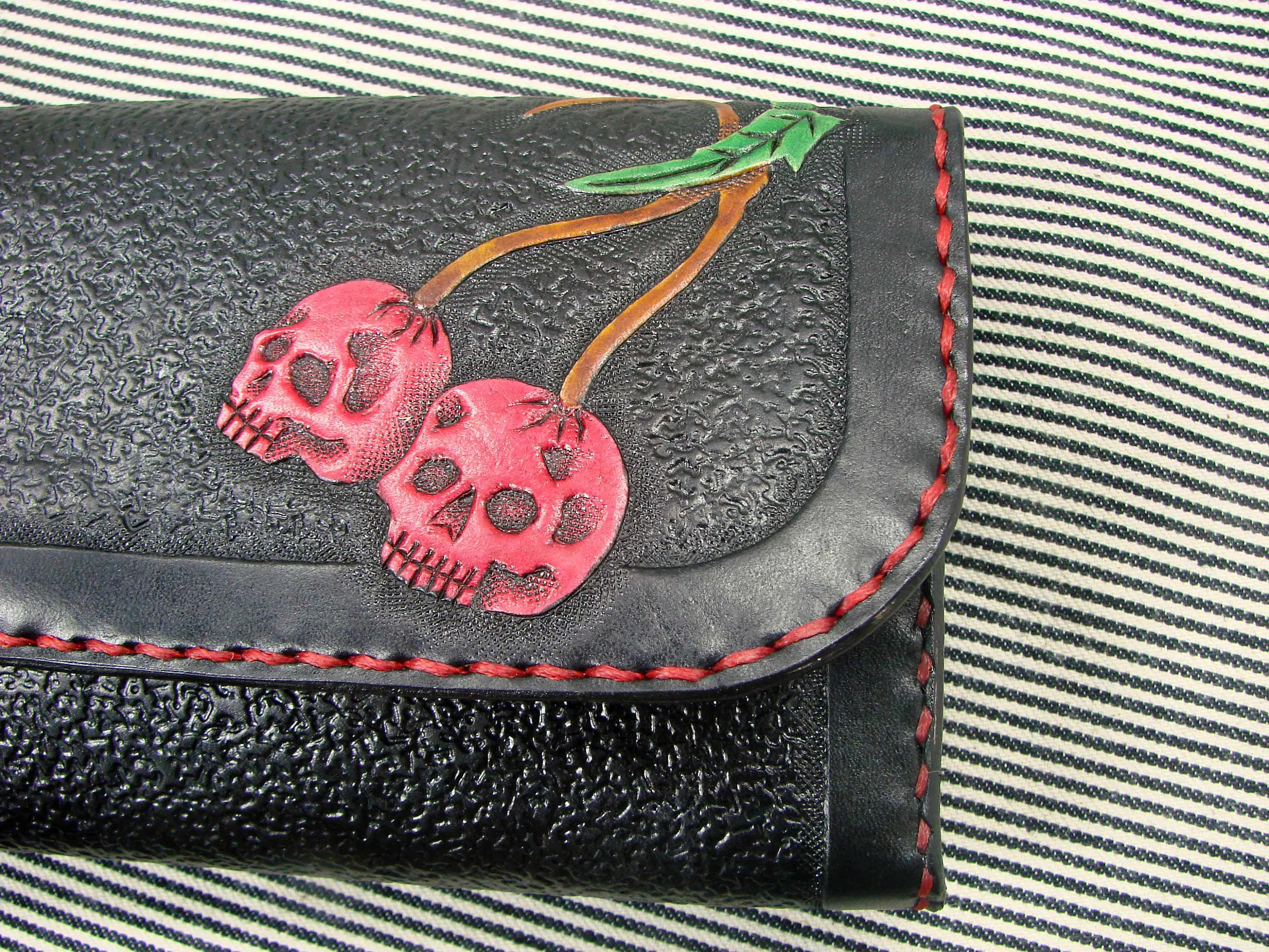 Rockabilly leather wallet with cherries and skull design for women.