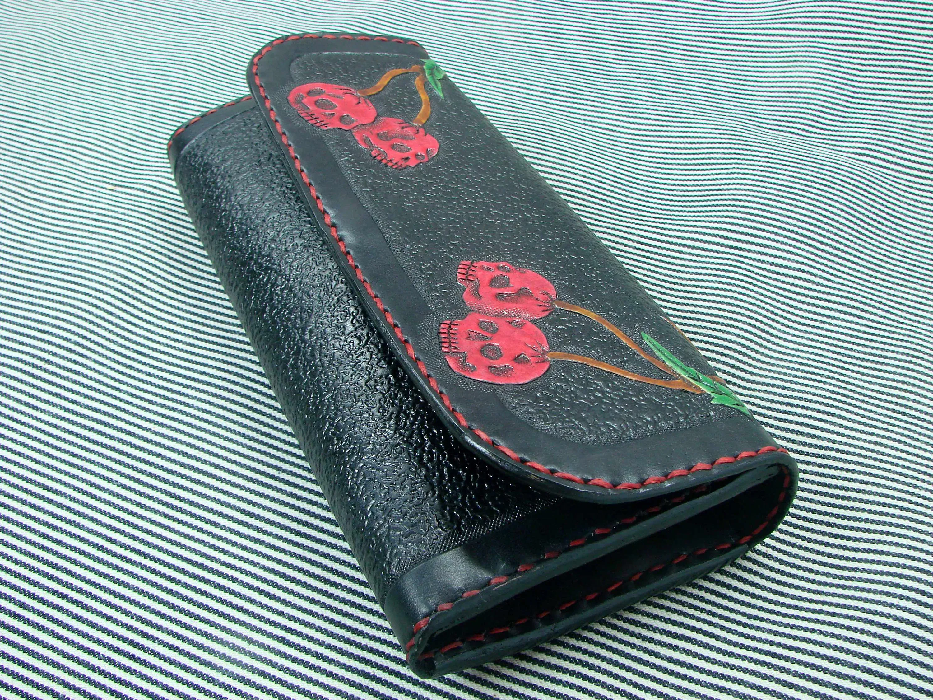 Rockabilly leather wallet with cherries and skull design for women.