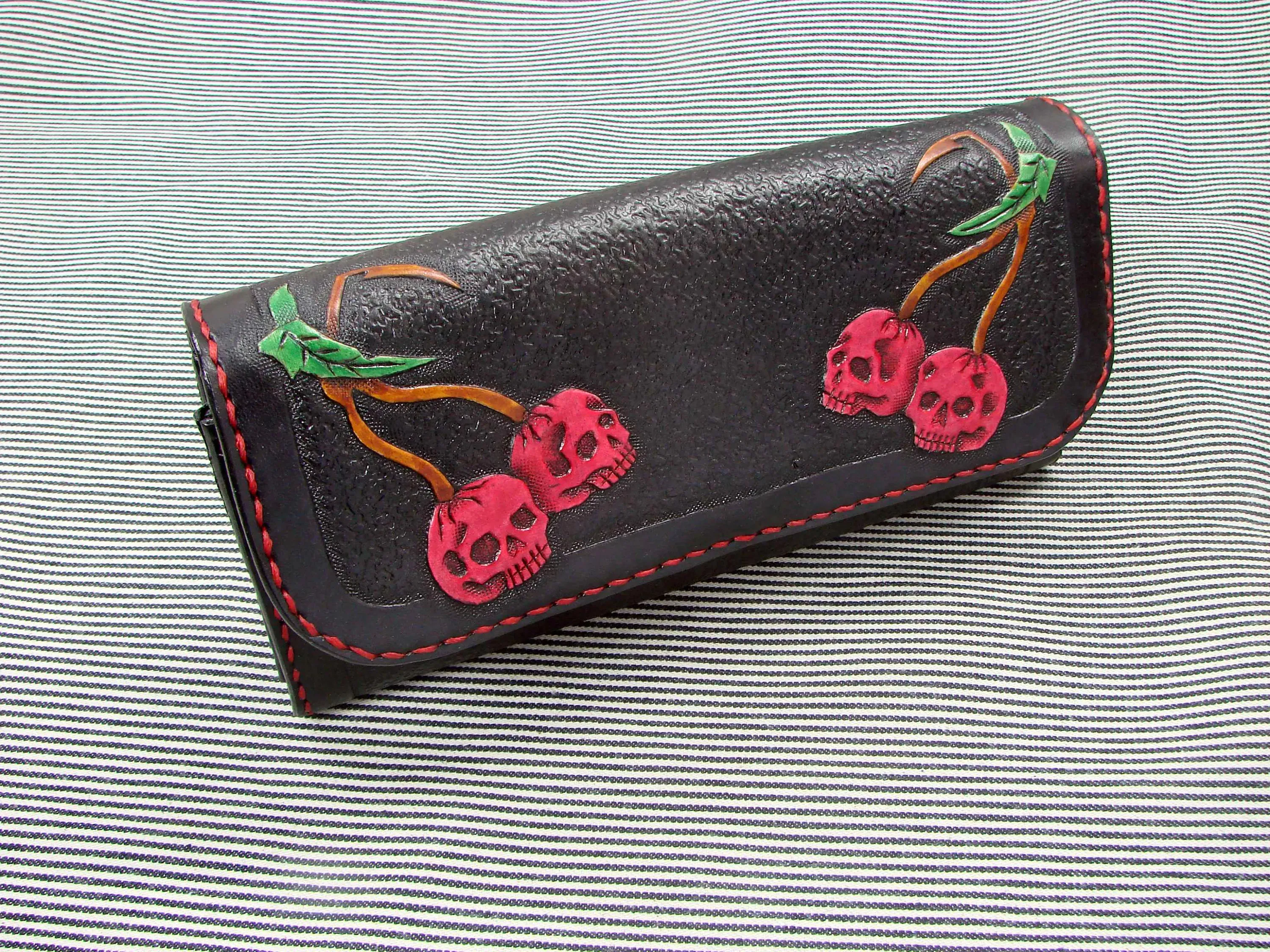 Rockabilly leather wallet with cherries and skull design for women.