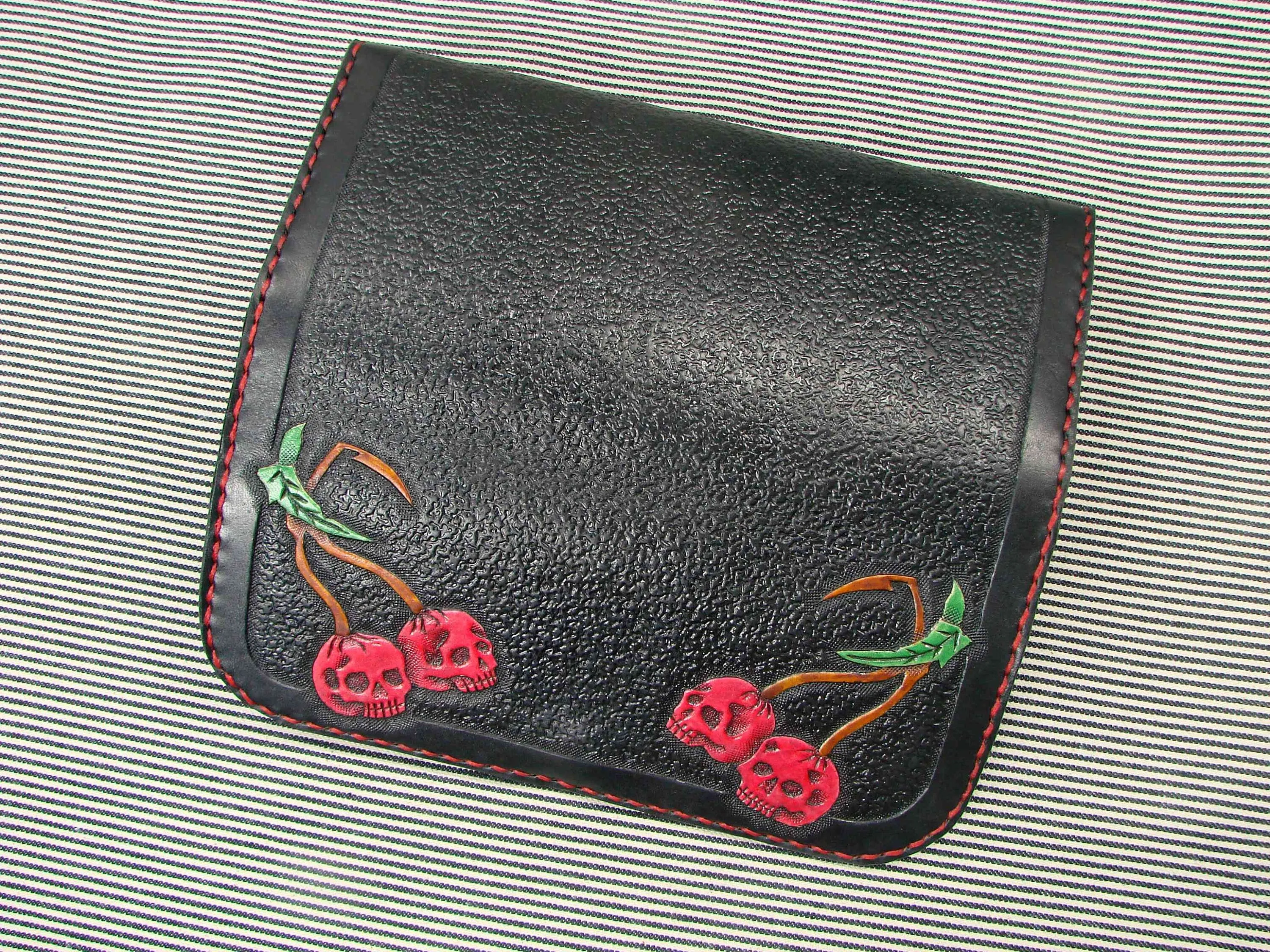 Rockabilly leather wallet with cherries and skull design for women.