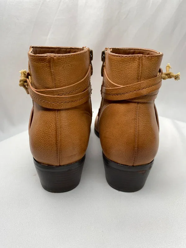 Brown faux leather ankle boots with no brand name, size 5.